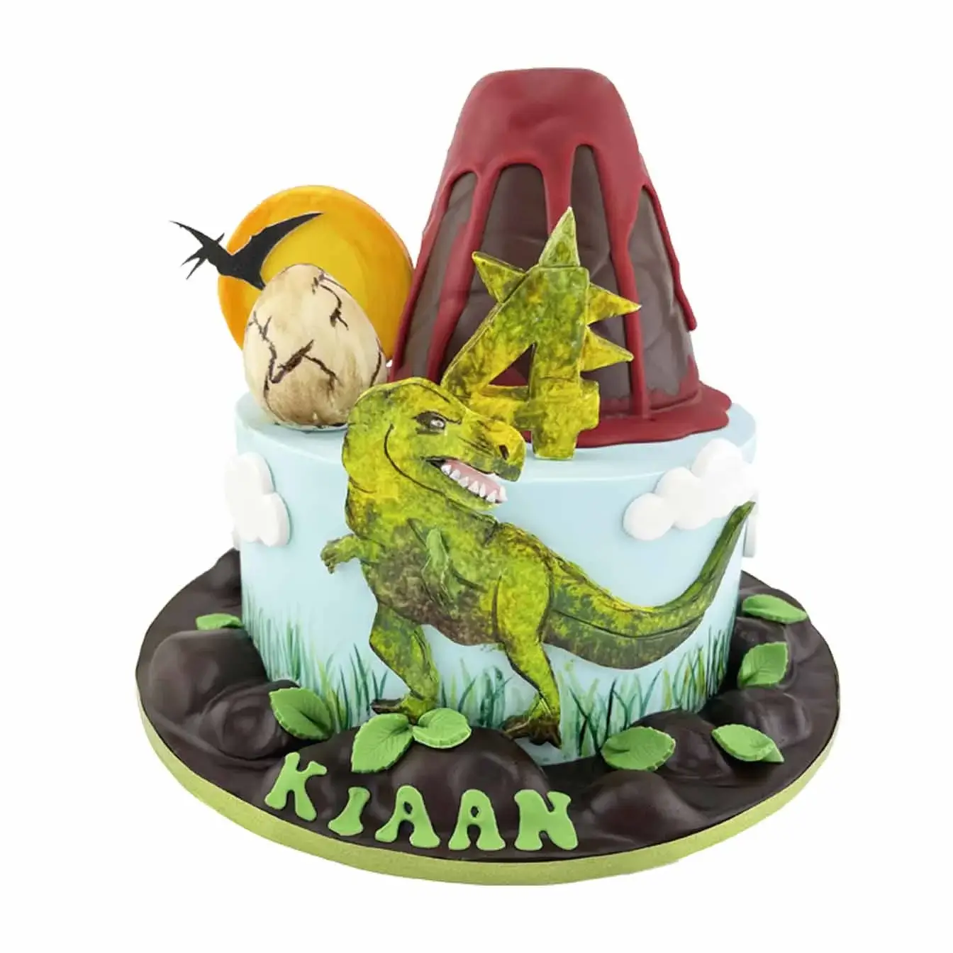 Dinosaur cake with T-Rex cutout, volcano, and dinosaur egg decorations.