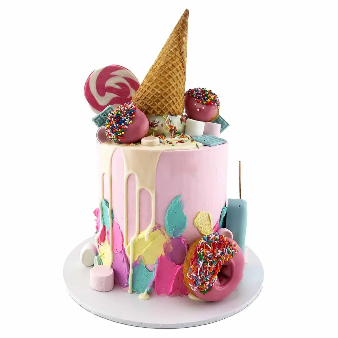 Ice cream drip cake: colourful layers of cake topped with lollies, donuts, and pastel-coloured icing drips.
