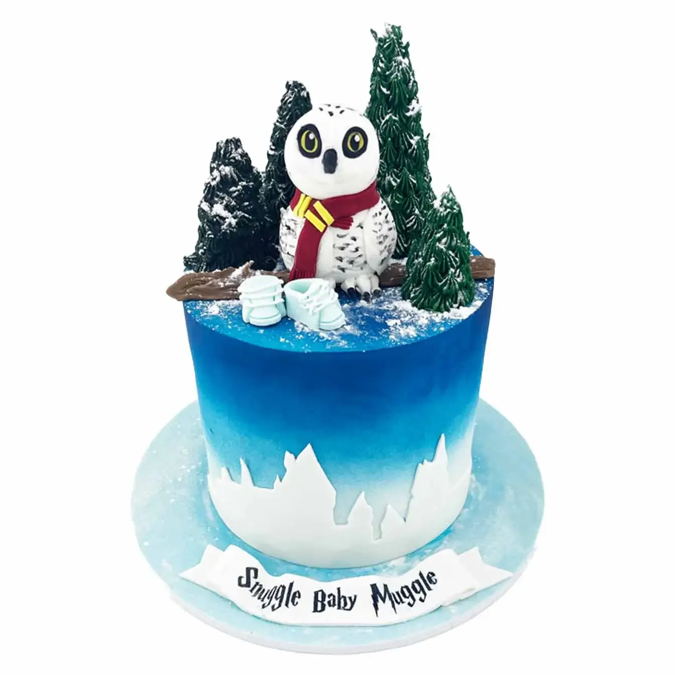 Harry Potter Magic Baby Shower Cake - A cake featuring Hedwig, a cutout silhouette of Hogwarts Castle, and the phrase 'Snuggle Baby Muggle,' a magical centerpiece perfect for Harry Potter-themed baby showers.