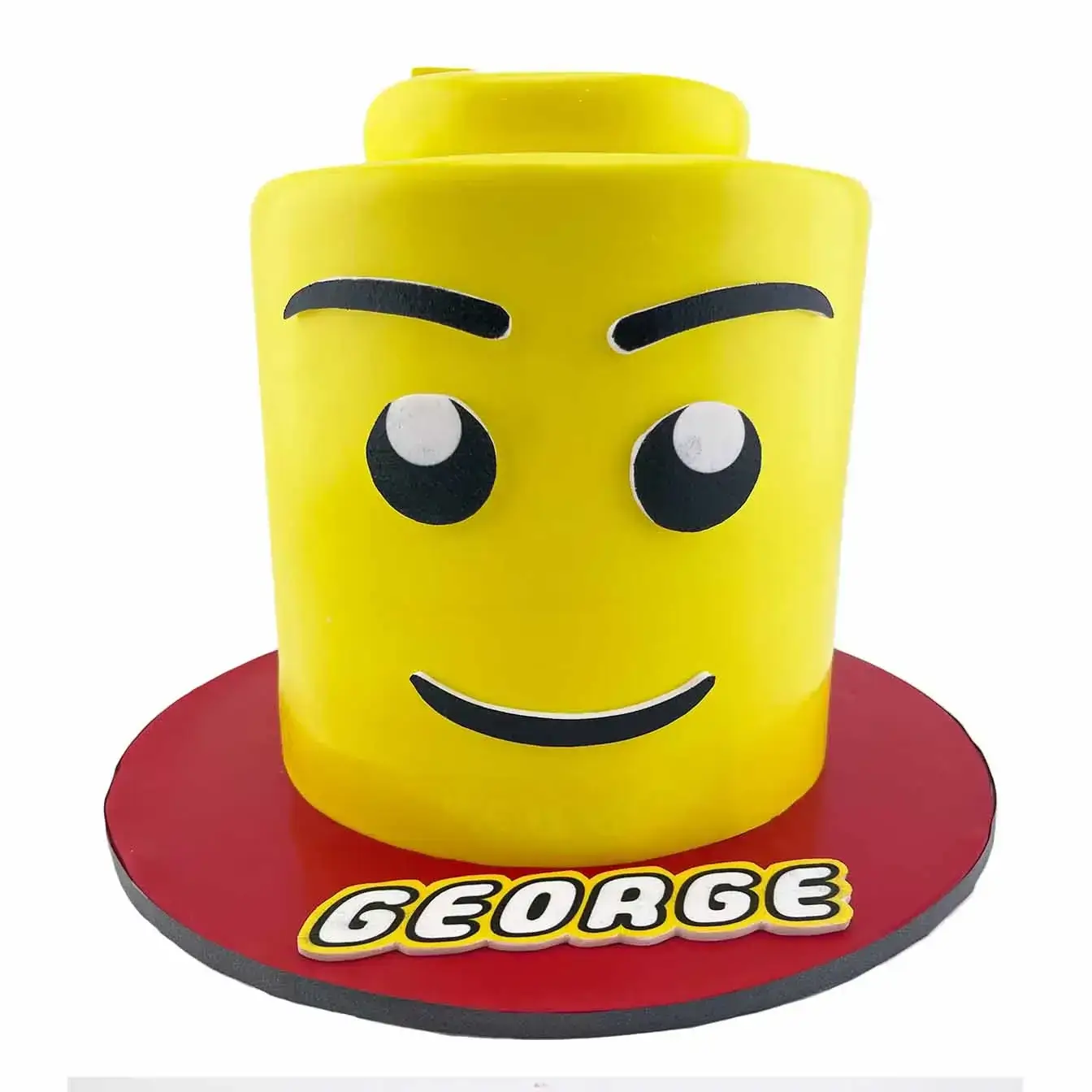 Lego Head Delight Cake - A cake shaped like the iconic Lego head, a playful centerpiece for birthdays and celebrations filled with creativity and fun.