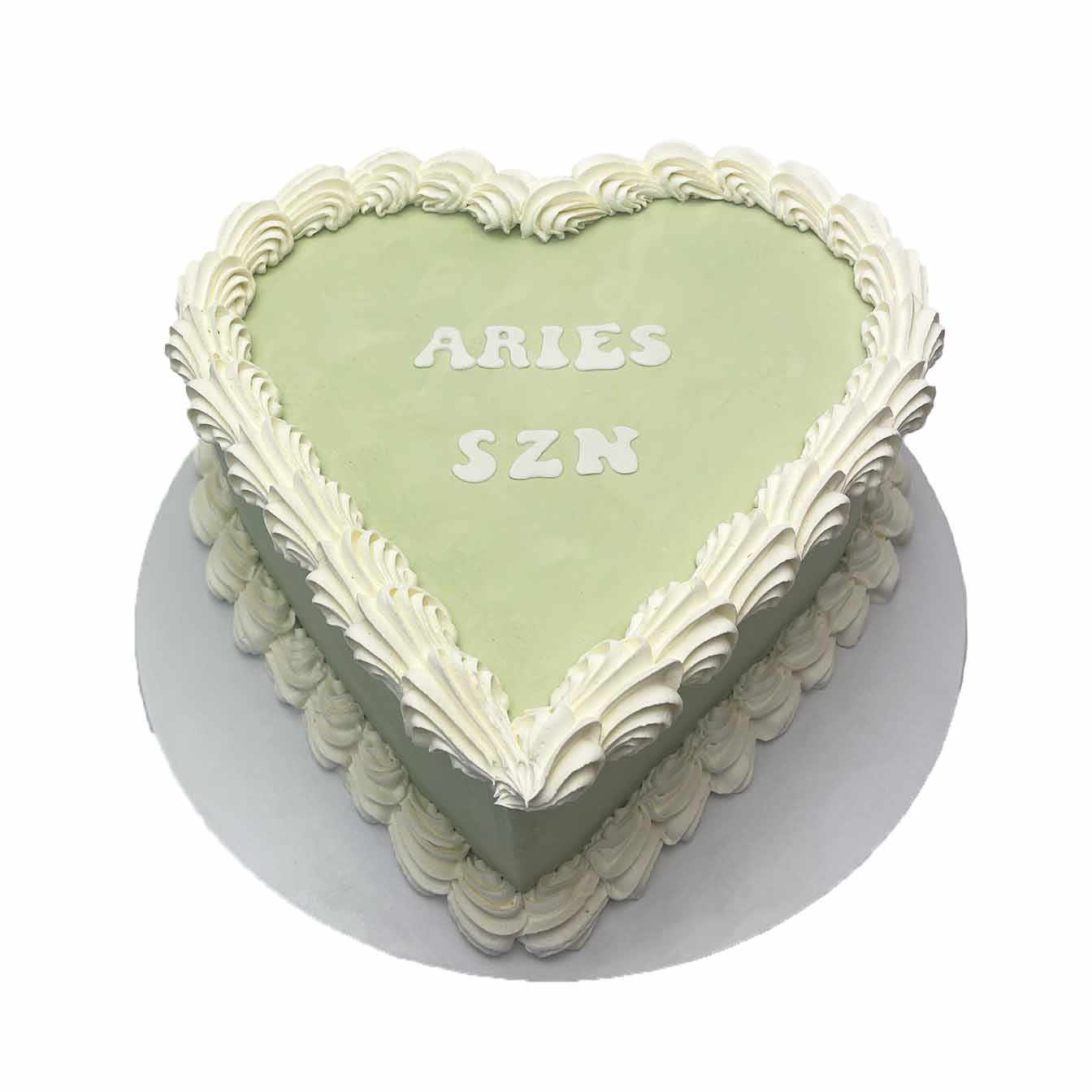 Heartfelt Love Cake - A heart-shaped cake with piped edges, a delightful centrepiece perfect for romantic occasions and heartfelt celebrations.
