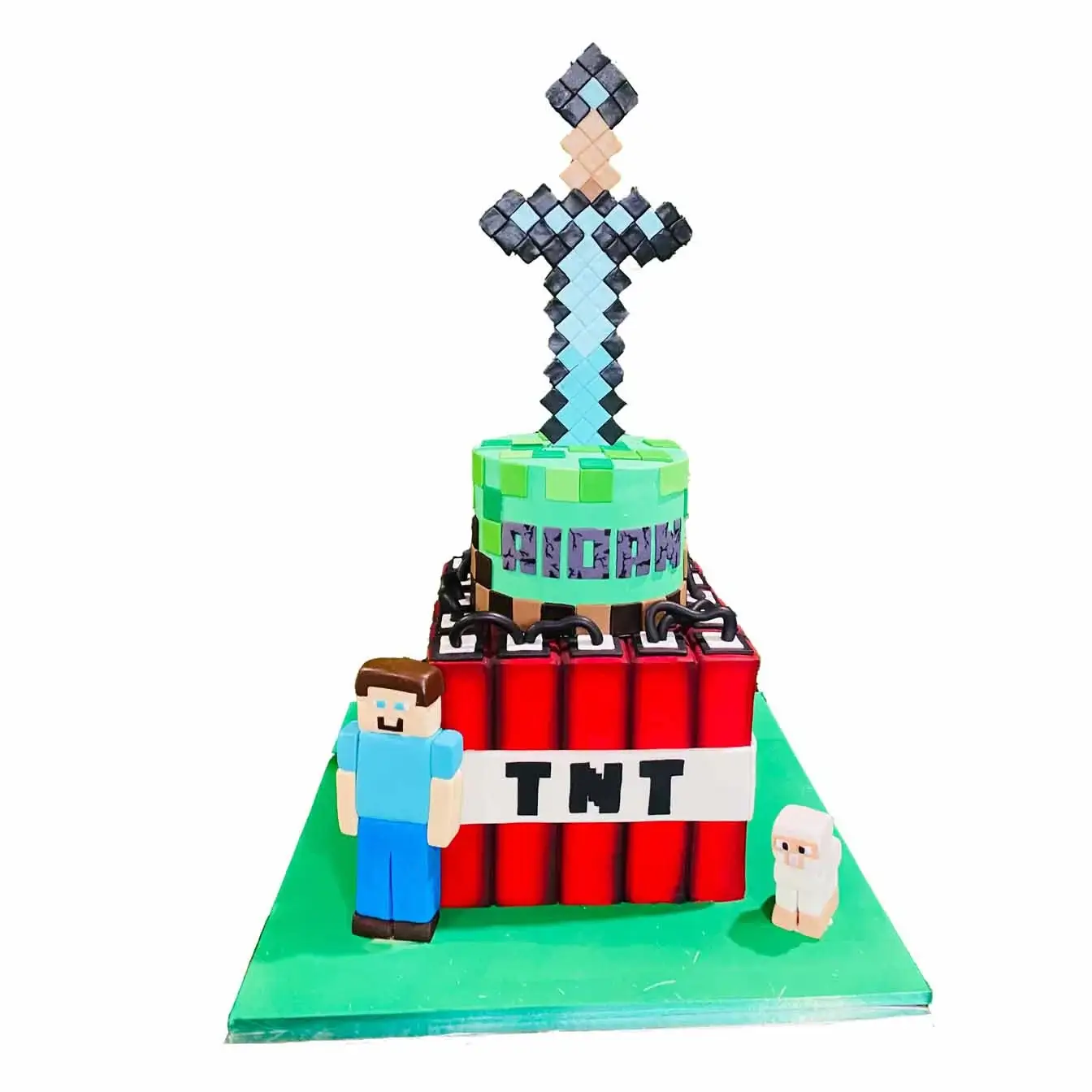Minecraft Adventure Cake - A two-tier cake with a TNT bomb bottom tier, and a green Minecraft top tier with a blue sword, a pixel-perfect centerpiece for gaming-themed celebrations.