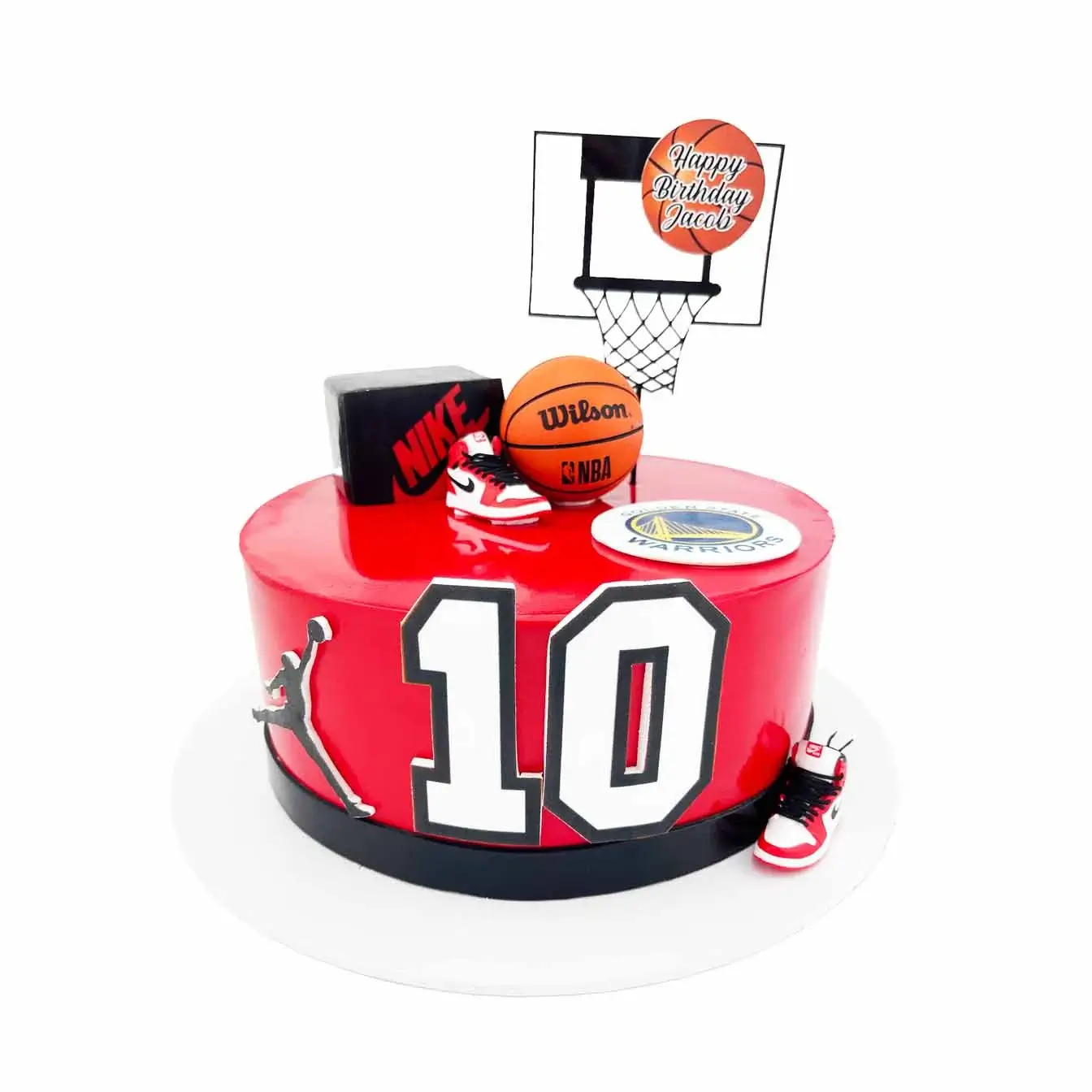 NBA Hoops Slam Dunk Cake - A basketball-themed cake with a hoop topper, basketball, Nike Air Jordan shoe, Nike shoe box, and custom age, a winning centerpiece for sports enthusiasts and celebrations filled with athletic flair.