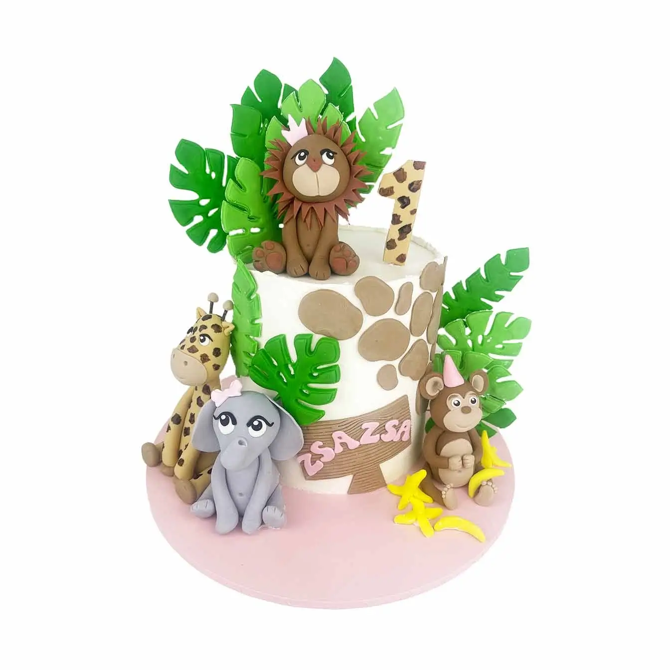Pink Jungle Paradise Cake - A whimsical masterpiece featuring fondant leaves and edible figures of a pink monkey, lion, elephant, and giraffe. Ideal for jungle-themed celebrations, this enchanting pink creation adds a delightful touch to your festivities.