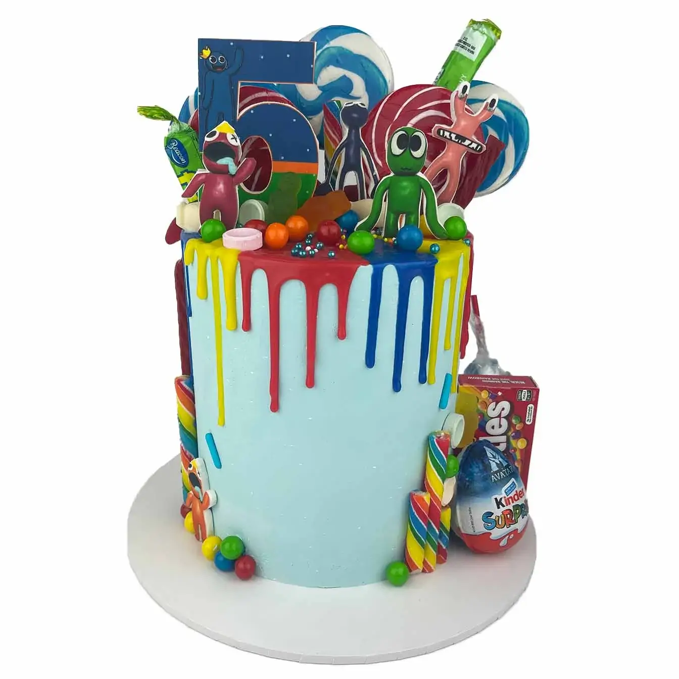 Rainbow Friends Cake - A cake with a colorful rainbow drip, assorted lollies, and 2D edible image characters of Rainbow Friends, a vibrant centerpiece for celebrations filled with friendship and fun.