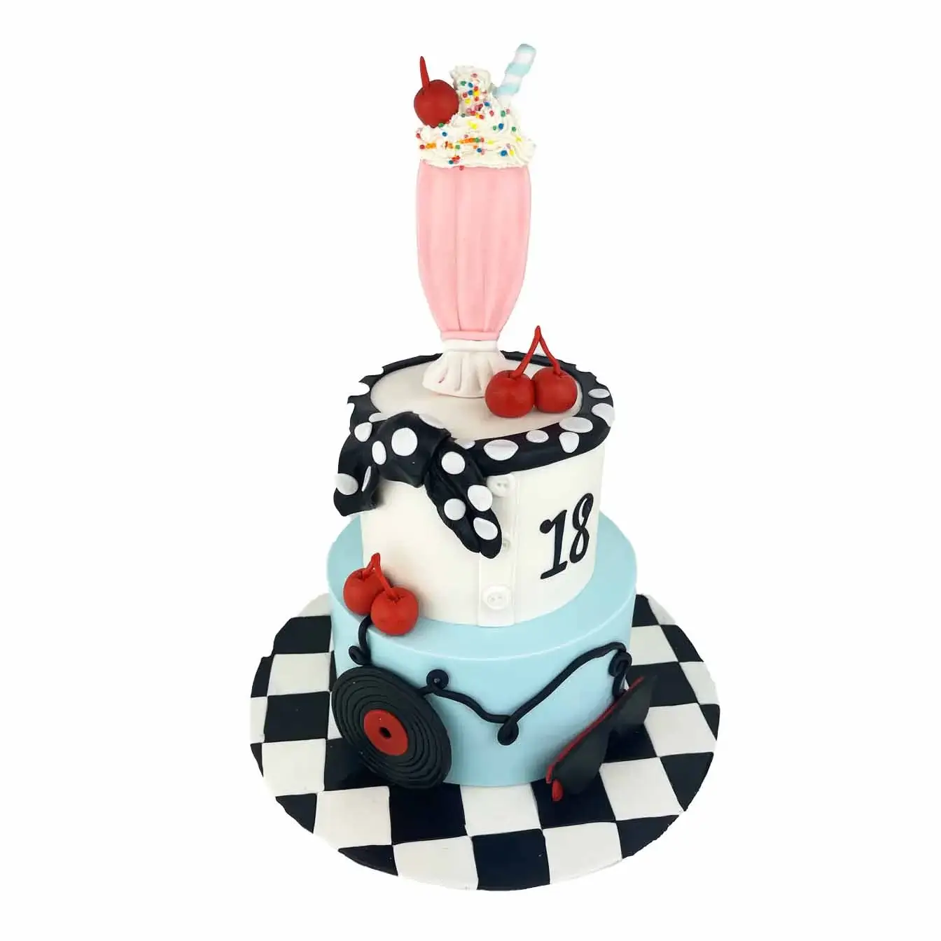 Retro Diner Delight Cake - Two-tier cake adorned with retro diner elements including milkshake, cherries, necktie, sunglasses, vinyl record, and diner-style iced board, perfect for a nostalgic celebration.