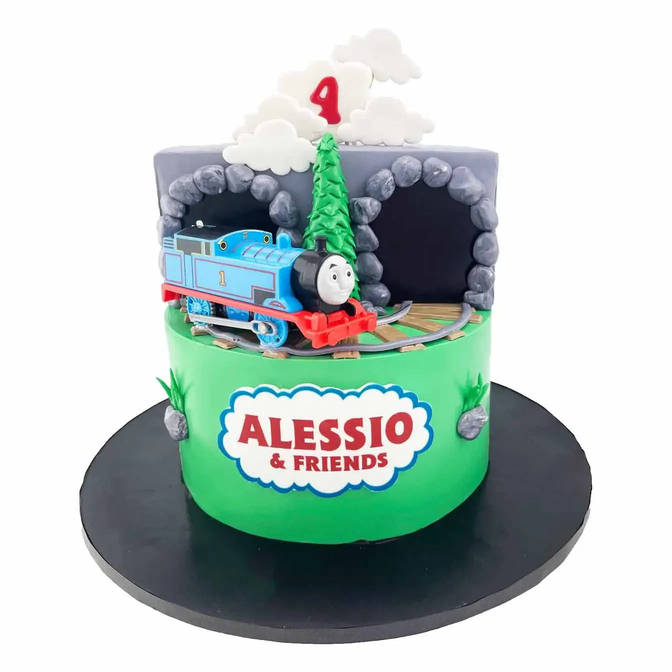 Thomas the Tank Engine Adventure Cake - A cake featuring a detailed Thomas train and a charming tunnel, a delightful centerpiece for fans of Thomas and his Island of Sodor adventures.