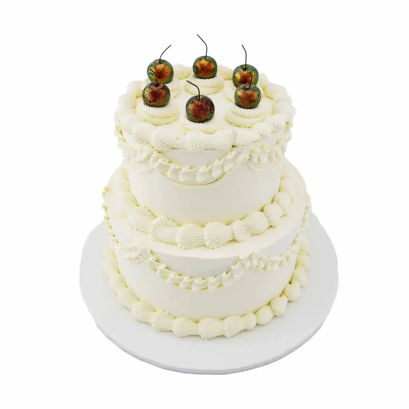 Two-tier vintage Heirloom Elegance Cake with white lambeth-style decoration